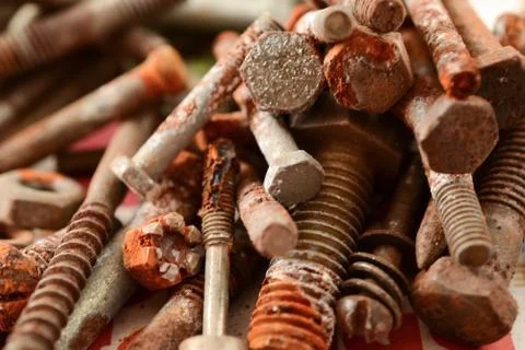 Many old rusty nuts and bolts Stock Photos