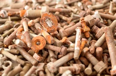 Many old rusty nuts and bolts Stock Photos