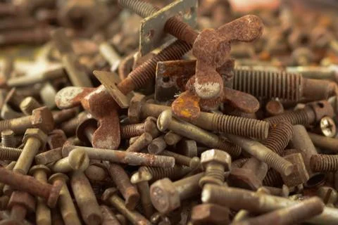 Many old rusty nuts and bolts Stock Photos
