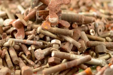 Many old rusty nuts and bolts Stock Photos