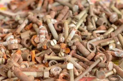 Many old rusty nuts and bolts Stock Photos
