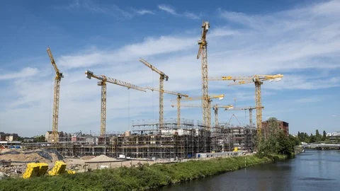 Many operating cranes at construction site in Berlin, timelapse Stock Footage 90344136