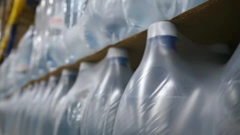 Many packaged water bottles in warehouse Stock Footage 269409742