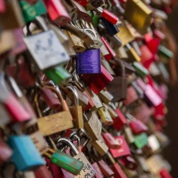 Many padlocks on a bridge Stock Photos