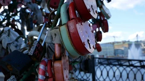Many padlocks hanging on bridge Stock Footage 77137234