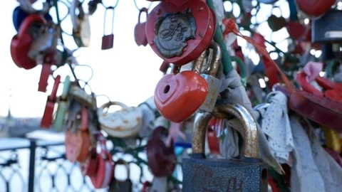 Many padlocks hanging on bridge 스톡 동영상 77137570
