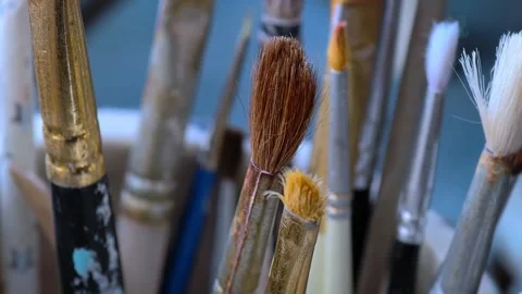 Many paint brushes in a jar. Creative hobby. 動画素材 291708645