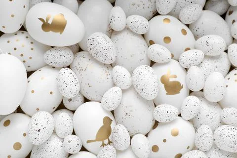 Many painted Easter eggs as background, top view Foto stock