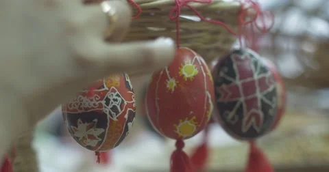 Many Painted Easter Eggs Colorful Painted Eggs Hang on Red Cords Technology of 動画素材 52220220