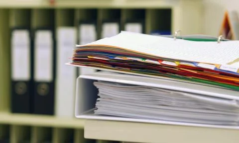 Many papers in file Stock Photos