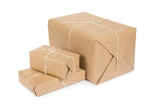 Many parcel boxes wrapped in paper isolated on white Foto stock