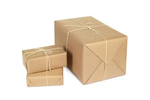 Many parcel boxes wrapped in paper isolated on white Foto stock