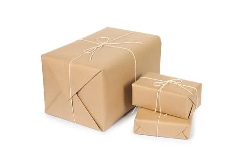 Many parcel boxes wrapped in paper isolated on white Stock Photos