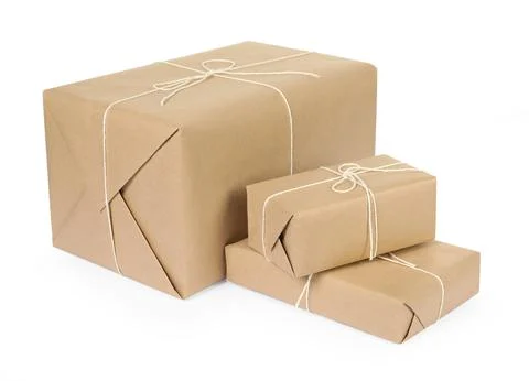 Many parcel boxes wrapped in paper isolated on white Foto stock