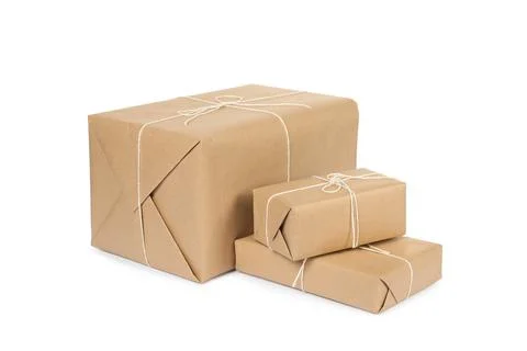 Many parcel boxes wrapped in paper isolated on white Stock Photos