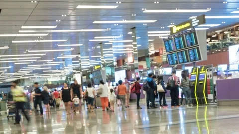 Many passenger walking in front of check-in counter Stock Footage 91975293
