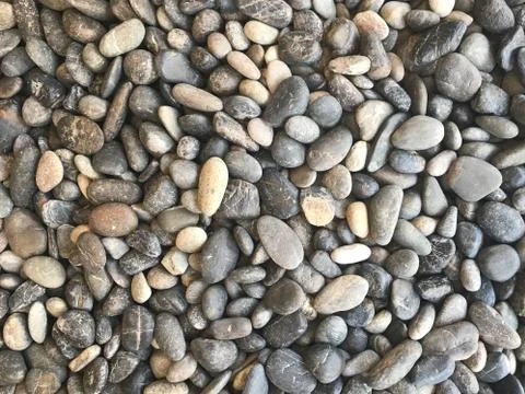 Many patterns of black, grey and off-white rocks Foto stock