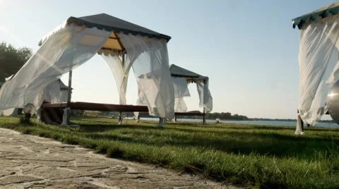 Many pavilions on the green grass Stock Footage 59759388