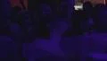 Many people grooving dancing in front of DJ's deck in nightclub HD Footage
