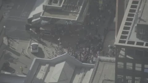 Many people at an intersection Stock Footage 68824261