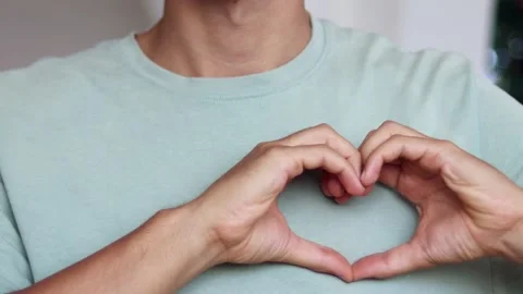 Many people make heart-shaped hands. Stock Footage 167347751