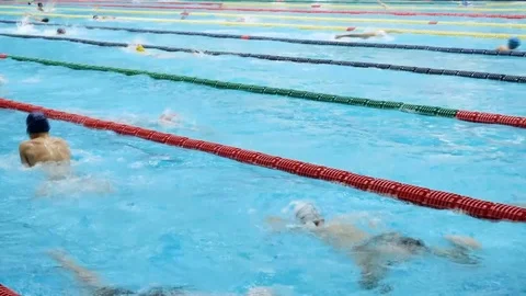 Many people swim in the pool Stock Footage 104803499