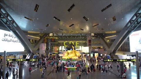 Many people walking inside in Hamad Inte... | Stock Video | Pond5