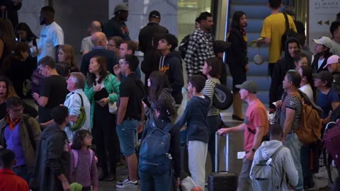 Many people walking inside in Hamad Inte... | Stock Video | Pond5