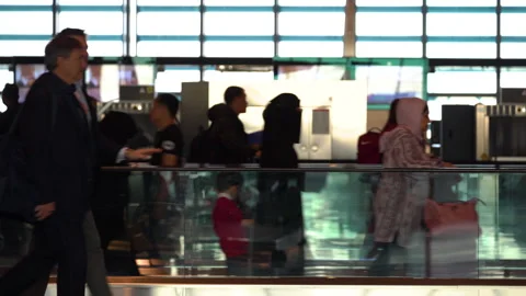 Many people walking inside in Hamad Inte... | Stock Video | Pond5