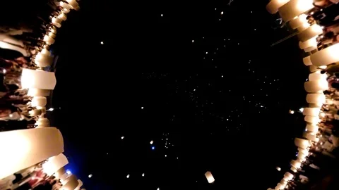 Many Peoples Release Flying Sky Lanterns Floating To The Sky (long shot) Stock Footage 126584549