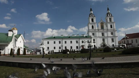 Many pigeons flying up on temples background Stock Footage 36585342