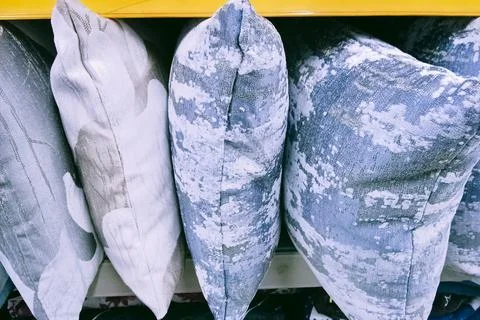 Many pillows of various patterns Stock Photos