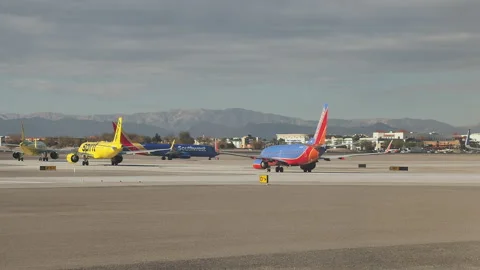 Many planes in line waiting to take off. Queue of airplanes for high air traffic Stock Footage 236716844
