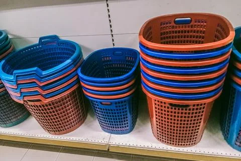 Many plastic laundry baskets Stock Photos