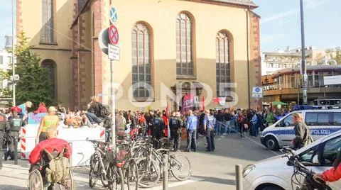 Many polices are watching on mass of crowd near Hauptwache. Mob, congregate. Stock Photos
