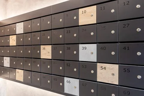 Many post boxes in modern apartment building. Postage boxes in an apartment.. Stock-Fotos
