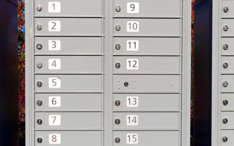 Many postage lockers mailbox array shipping messages Stock Photos