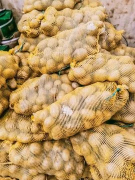 Many potatoes in the sack Stock Photos