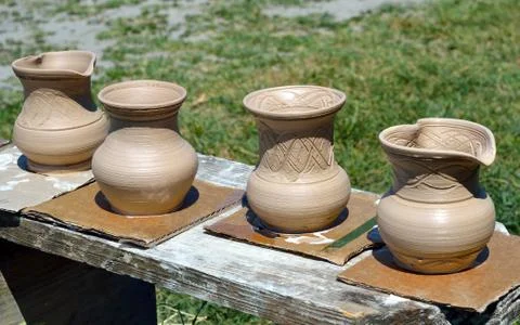 Many pots kept for drying in the sun Stock Photos