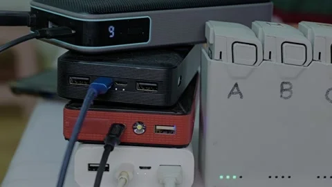 Many power banks charging at the same time. Stock Footage 346502373