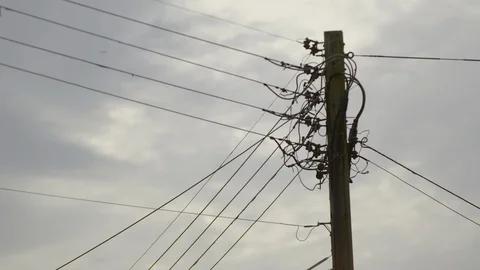 Many power lines attached to a utility pole Video stock 125043527
