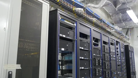 Many powerful servers running in the data center server room. Many servers in a Stock Footage 77925177