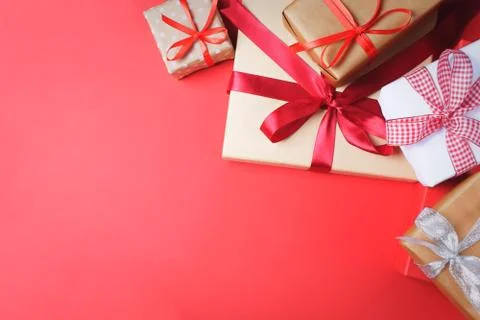 Many presents on red background. Stock Photos