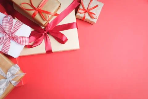 Many presents on red background. Stock Photos