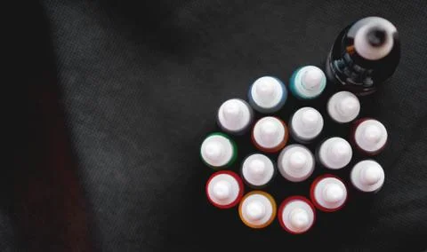 Many professional bottles with colored ink for tattoos Stock Photos