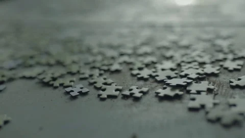 Many puzzle pieces on the table 動画素材 84032213