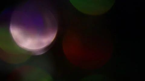 Many rainbow lights from the left in the darkness 스톡 동영상 309889549