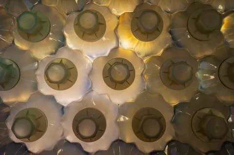 Many recycle plastic form a structure Foto stock