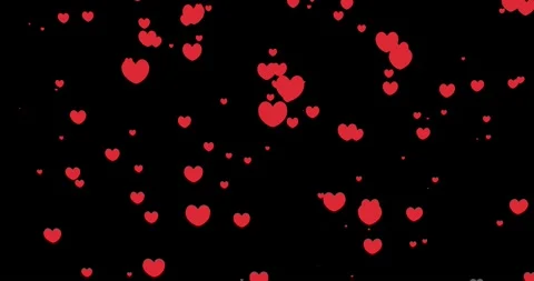 Many red hearts falling down from above against black background Stock Footage 132463190