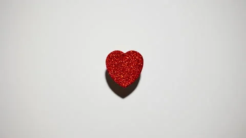 Many Red Hearts stop motion animation collide together in One heart and beats Stock Footage 229655676
